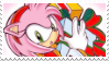 Sonic Adventure holiday art of Amy Rose holding a stack of presents.